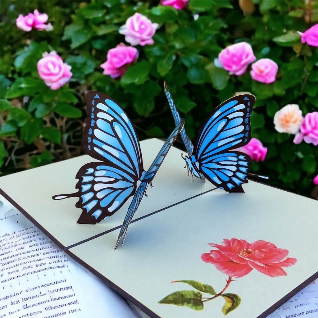 https://onlinepartysupplies.com.au/cdn/shop/files/handmade-blue-butterfly-3d-origami-pop-up-insect-animal-greeting-card-2_1600x.jpg?v=1684209782