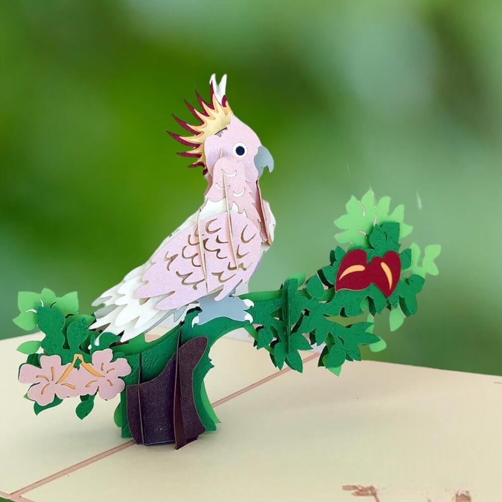 https://onlinepartysupplies.com.au/cdn/shop/files/handmade-pink-cockatoo-3d-origami-pop-up-bird-animal-blank-greeting-card-3_1600x.jpg?v=1684167205