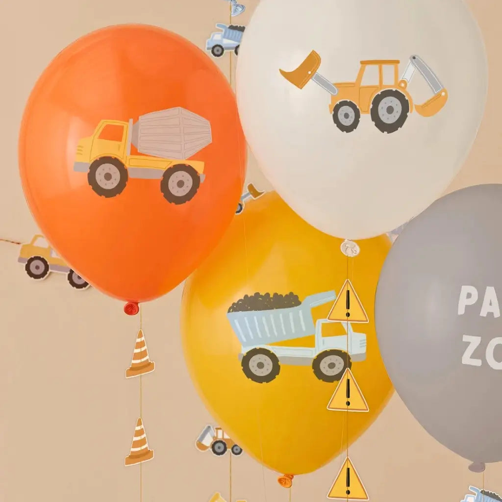 Diggin’ It construction balloons with decorative vehicle tails