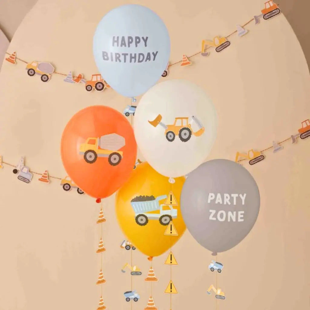 Diggin’ It construction balloons with decorative vehicle tails