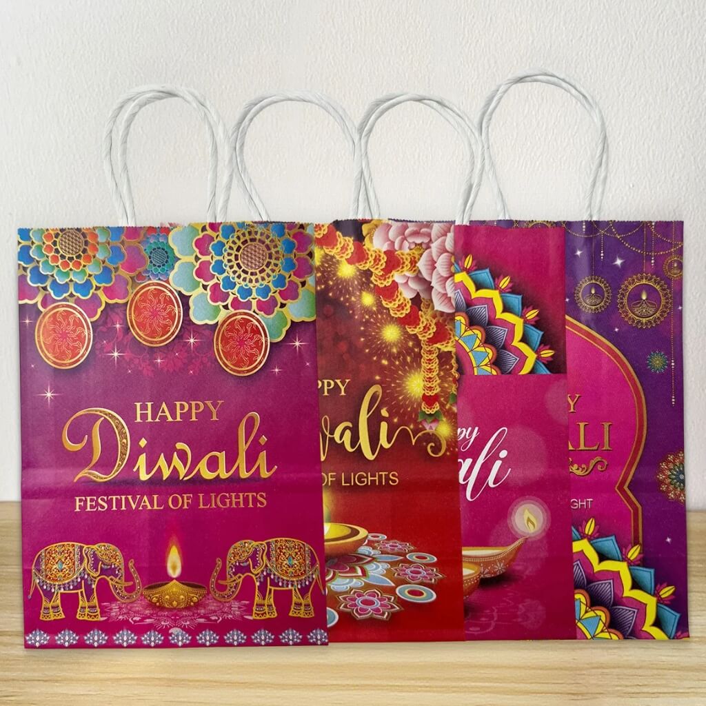 4 Diwali-themed paper bags with colorful designs and 'Happy Diwali Festival of Lights' text.