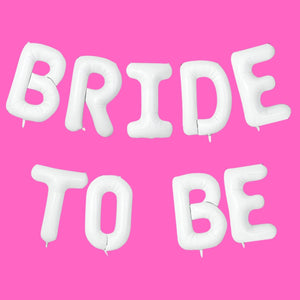 White foil letter balloons spelling BRIDE TO BE for bachelorette celebration