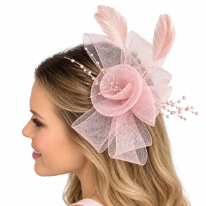 Dusty pink mesh fascinator clip with soft feather details