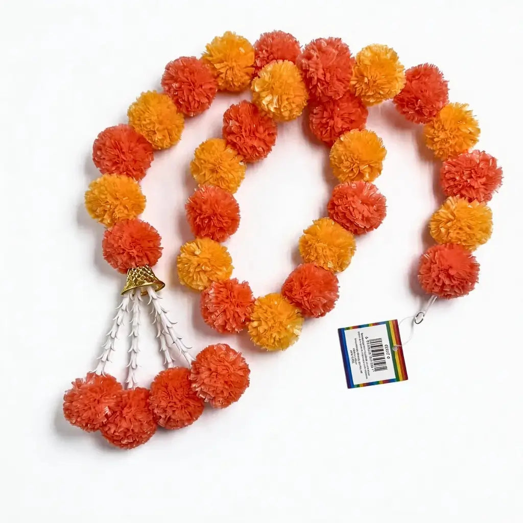 Orange Indian traditional pom pom garland with hanging bell decoration