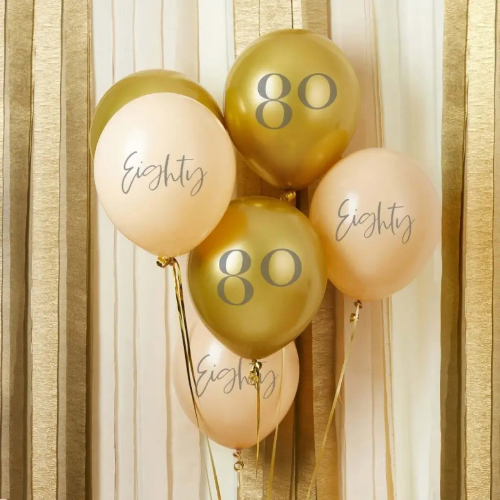 Gold and ivory 80th birthday latex balloons measuring 30cm