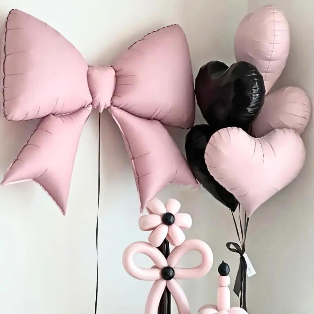 Jumbo Ribbon Bow Knot Foil Balloon in red, white sand, metallic gold, pastel purple, pastel pink & pastel blue