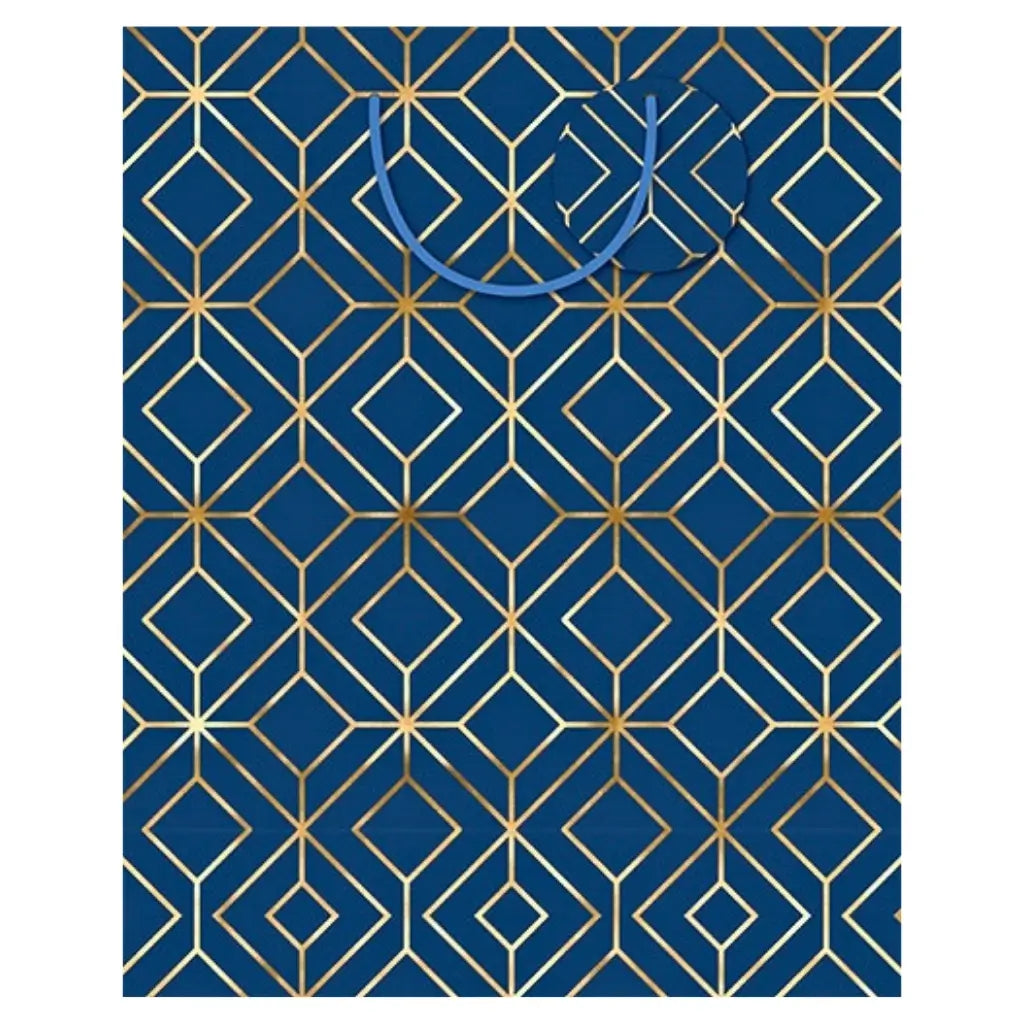 Large navy blue gift bag with gold geometric foil pattern, ribbon handles and matching gift tag