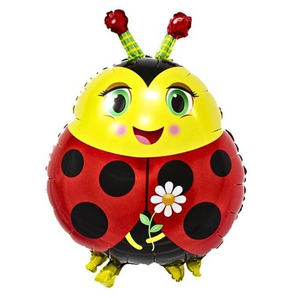 Colourful ladybug-shaped balloon against a white brick wall background