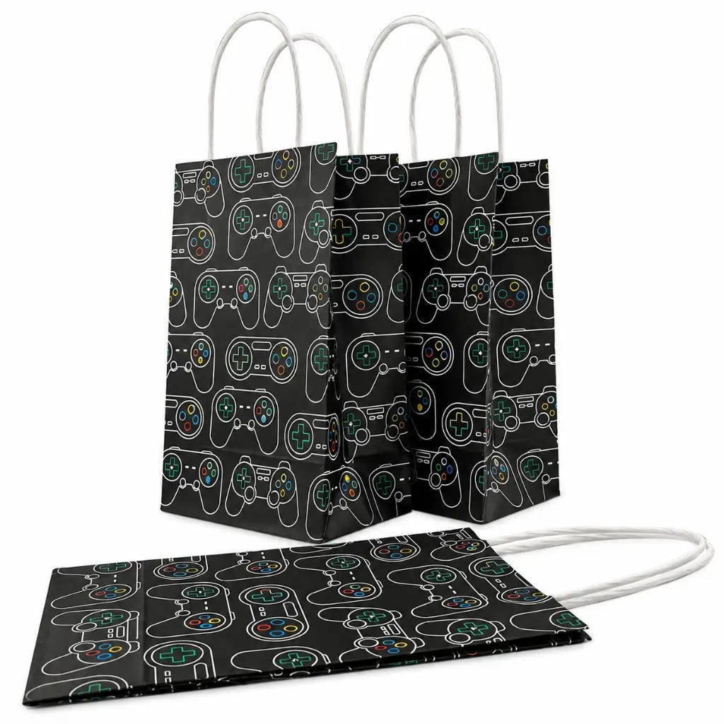Level Up gaming paper party bags with black video game controller pattern and white twisted handles, pack of 5