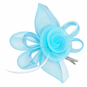 Brooke light blue mesh flower fascinator hair clip worn with loose waves