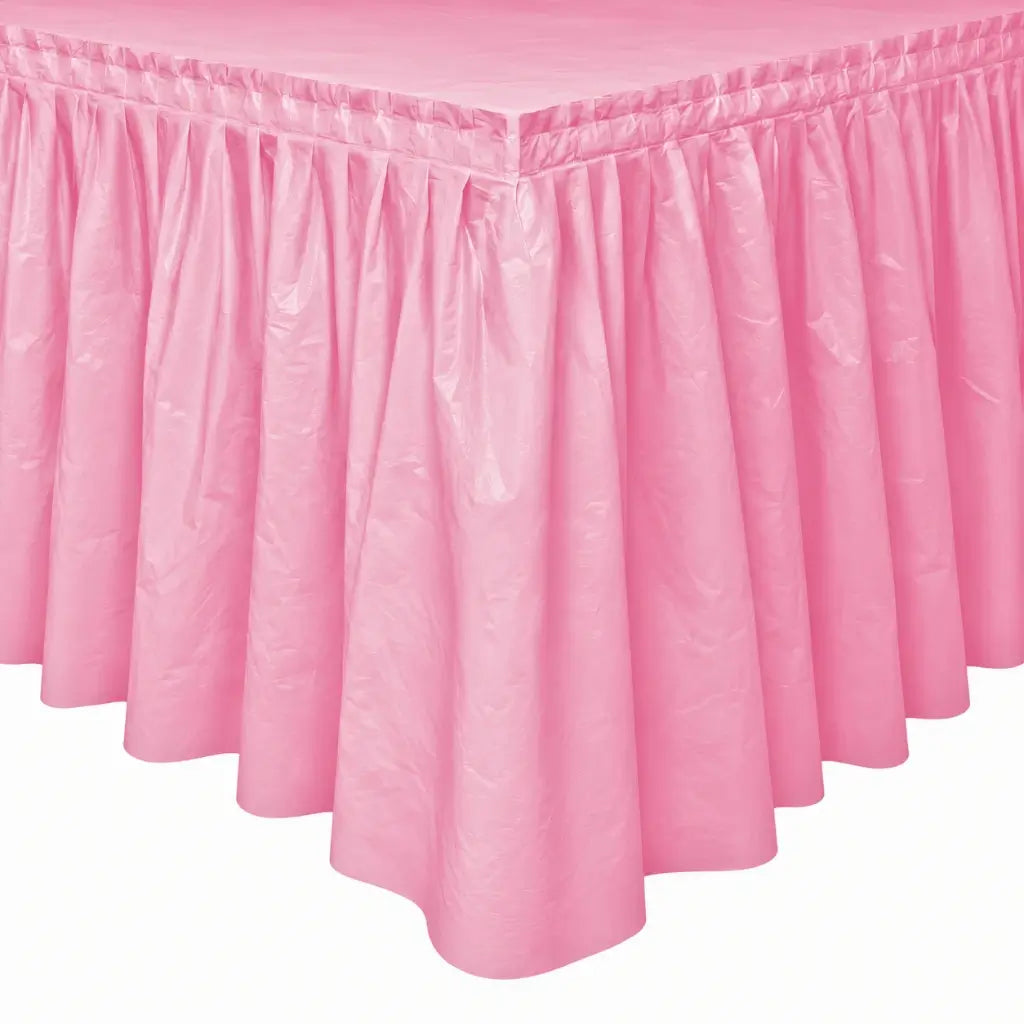 Lovely pink plastic party table skirt with gathered pleats measuring 73cm high and 4.3m long