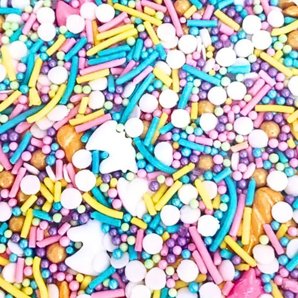 Gold horn and unicorn-shaped sprinkles for dessert décor