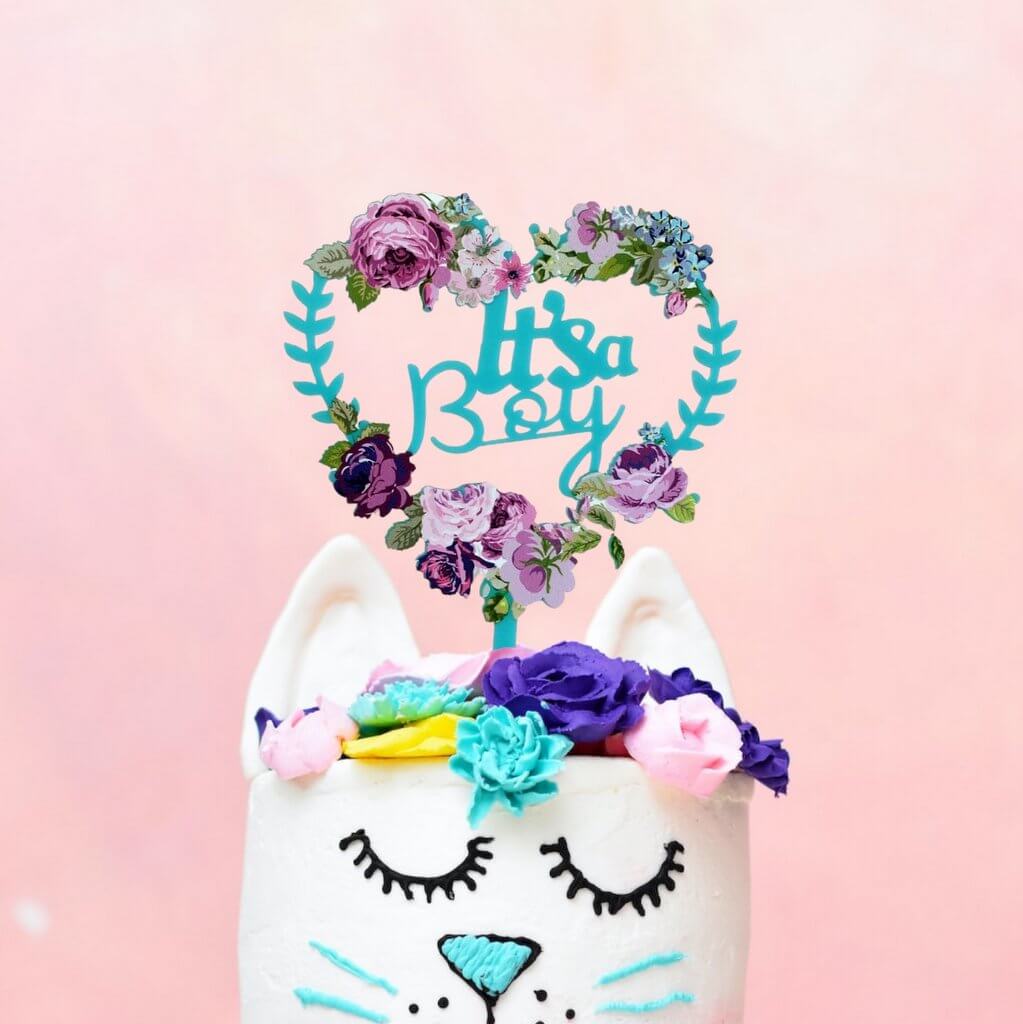 Matte Blue Acrylic 'It's a Boy' Floral Heart Shaped Wreath Cake Topper - Online Party Supplies