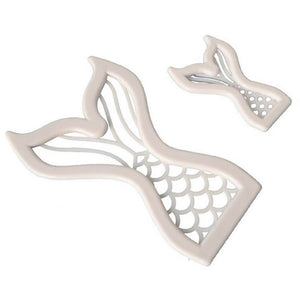 two plastic mermaid tail cookie cutters in large and small sizes