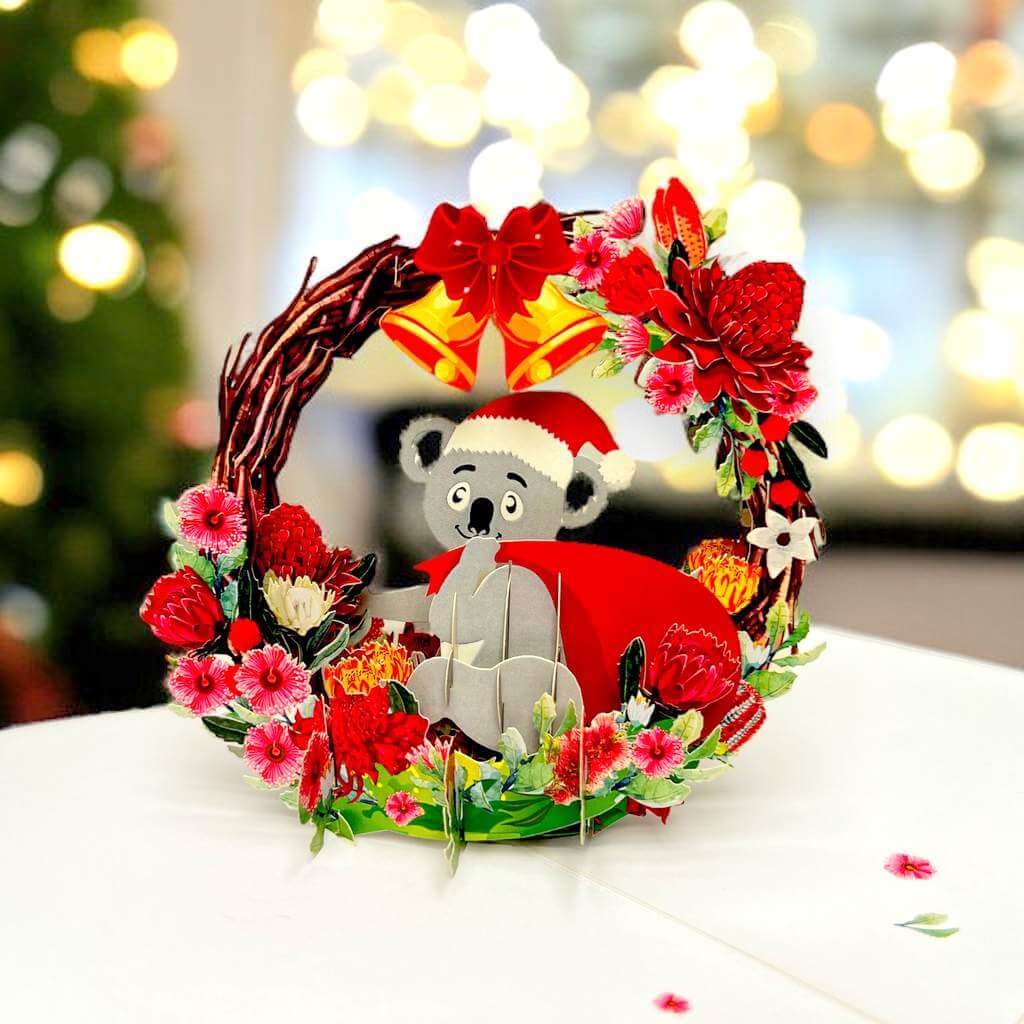 Christmas Koala in Red Native Flower Wreath Pop Card
