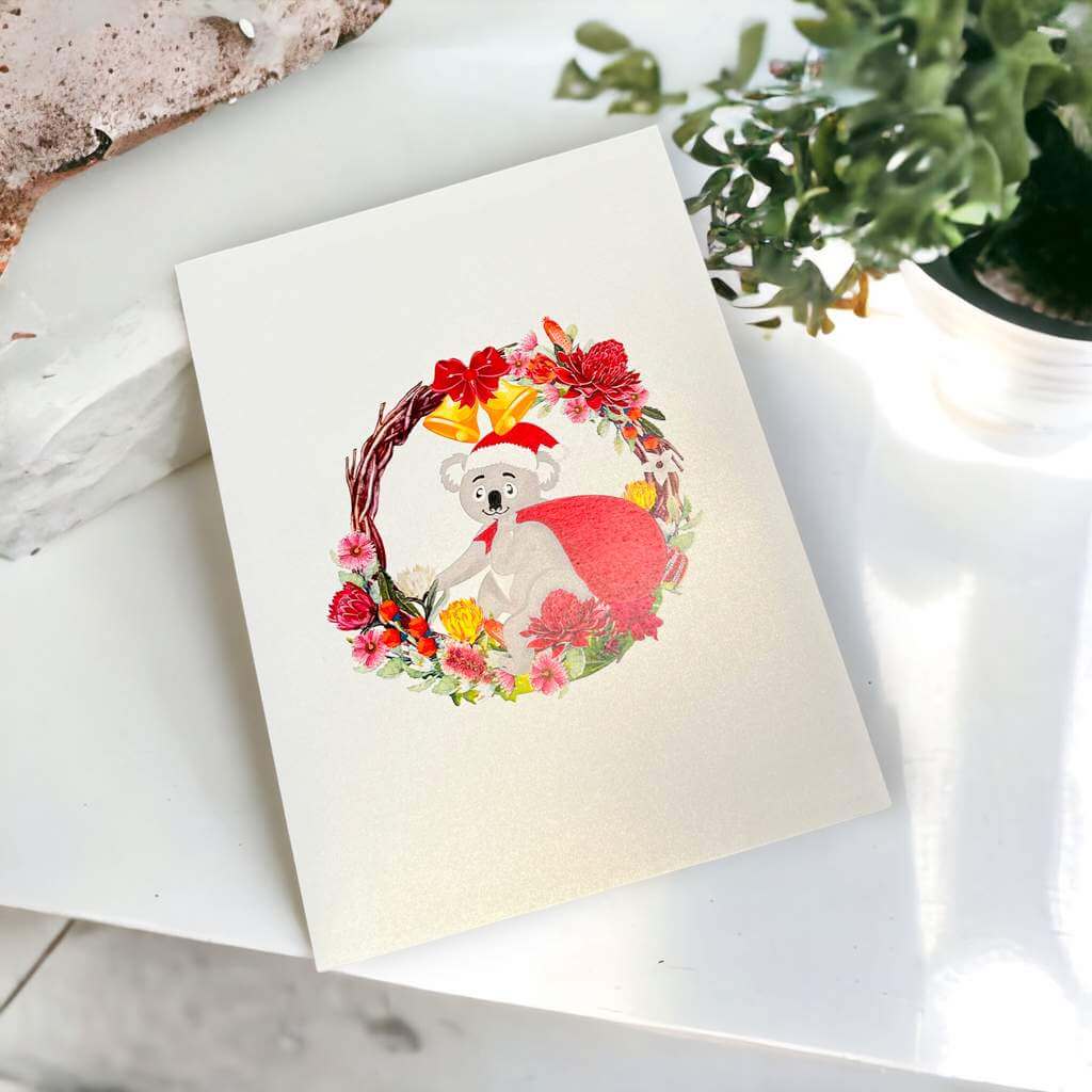 Christmas Koala in Red Native Flower Wreath Pop Card