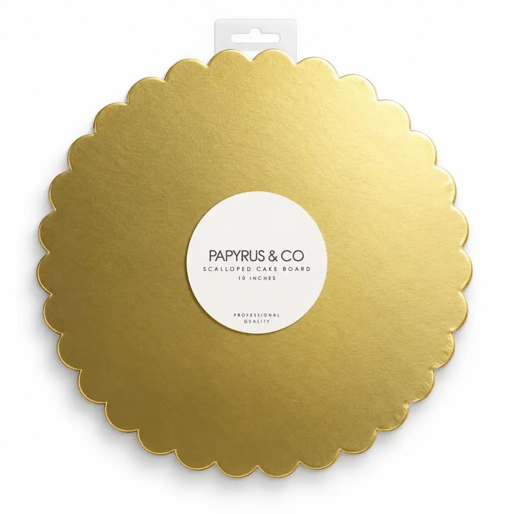 Metallic gold round cake board with decorative scalloped edges