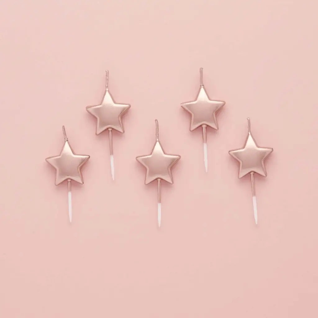 Metallic Mix Up rose gold star candles with attached cake picks