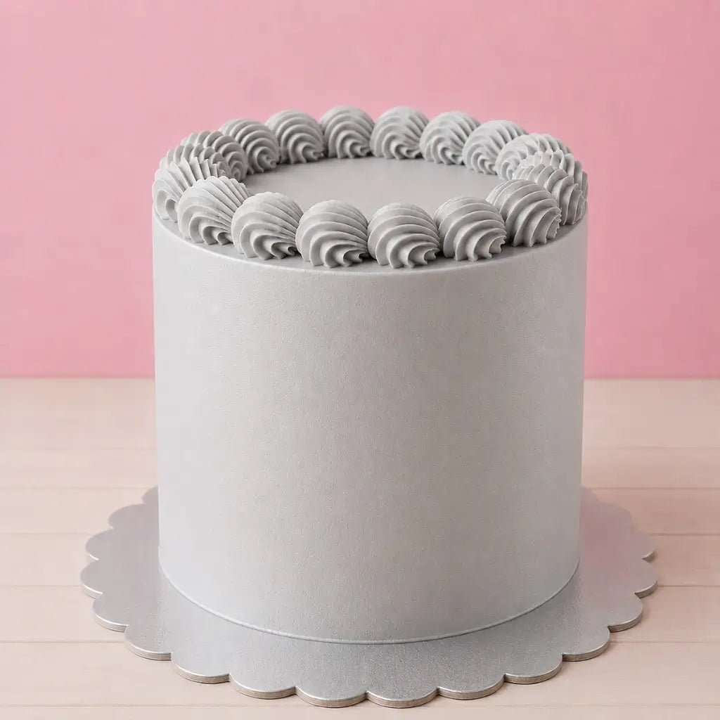 Papyrus silver scalloped cake board measuring 25.4cm
