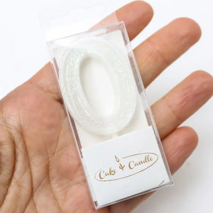 Decorative white number 0 candle for celebration cake