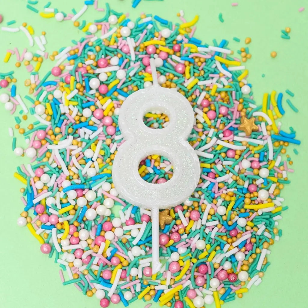 Mini white glitter number 8 candle for birthday cake
