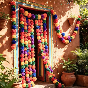 Colourful Indian rainbow pom pom garland decorating a doorway for a Diwali celebration