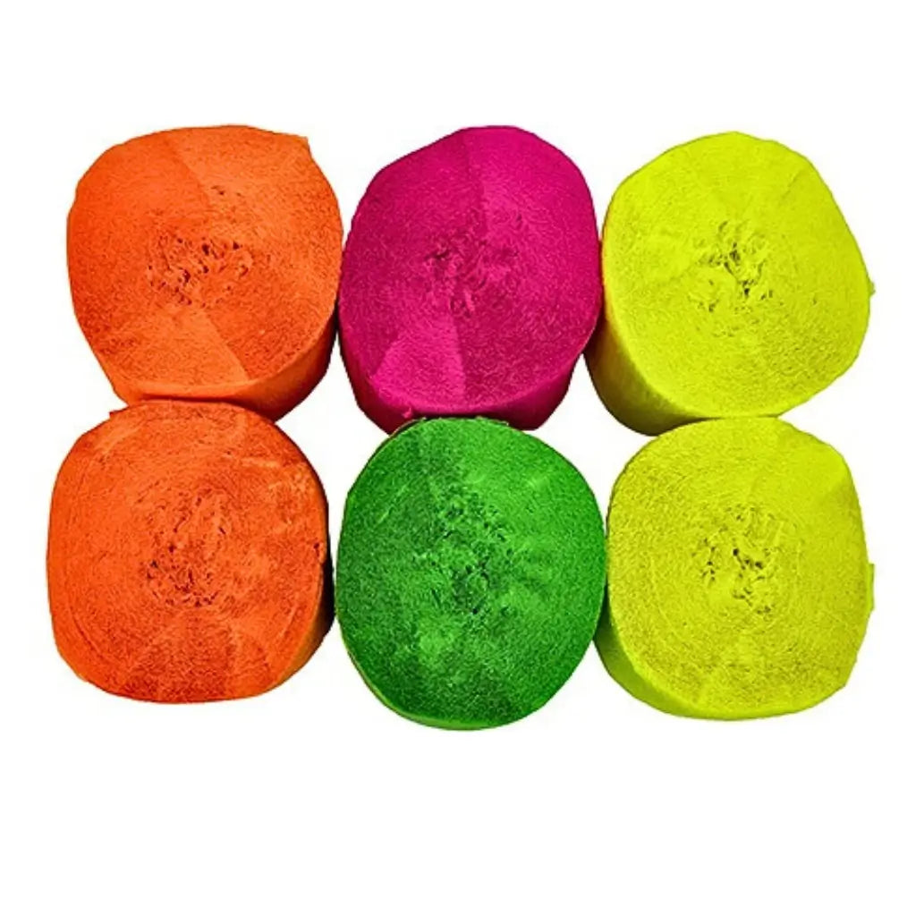 Neon crepe paper streamers glowing under blacklight