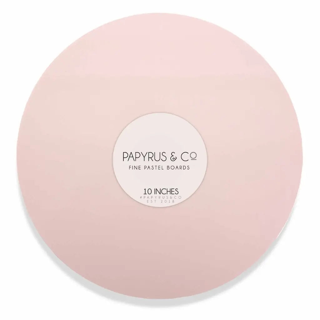 Papyrus & Co pastel pink round masonite cake board measuring 10 inches in diameter
