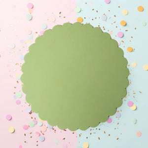 Green scalloped presentation board for celebration cakes