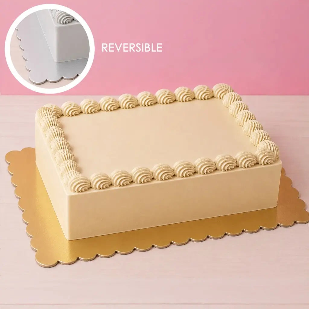 Reversible gold and silver rectangle cake board with scalloped edges