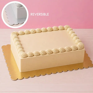 Reversible gold and silver rectangle cake board with scalloped edges