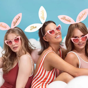 Metallic gold Bride Babes lettering on pink bunny ear headbands