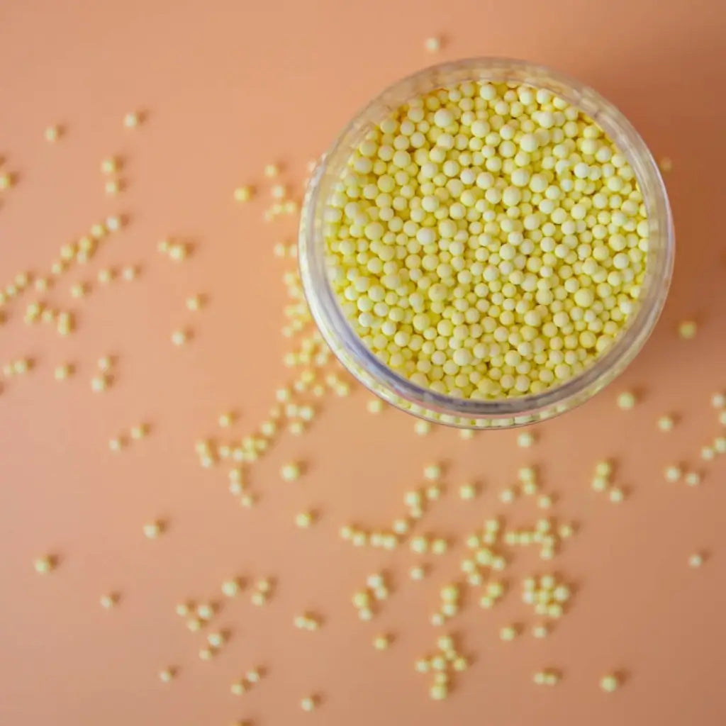 Matte pastel yellow sugar beads for decorating desserts