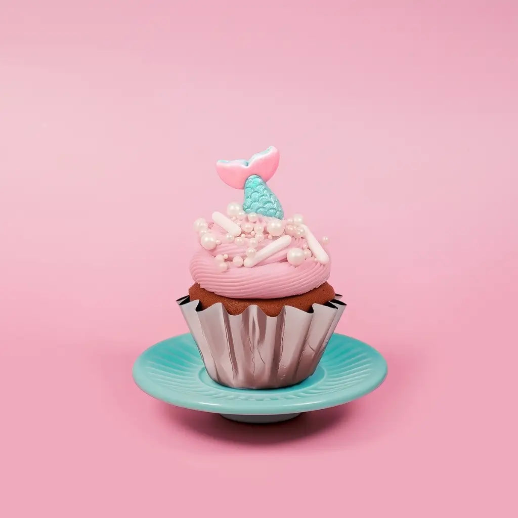 Pastel pink and aqua edible mermaid cake toppers by Sprinks