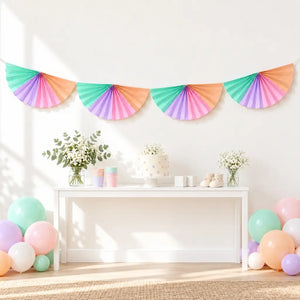 Pink lilac mint and peach paper fans joined as a party garland