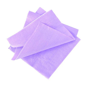 Pastel purple beverage napkins folded on white background