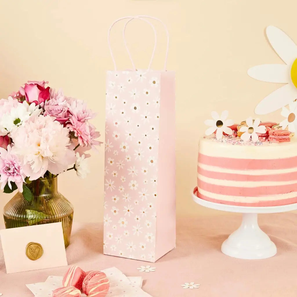 Pink daisy patterned bottle gift bag for birthdays, weddings, or parties