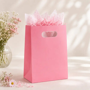 Bright pink goodie bags for girls' parties