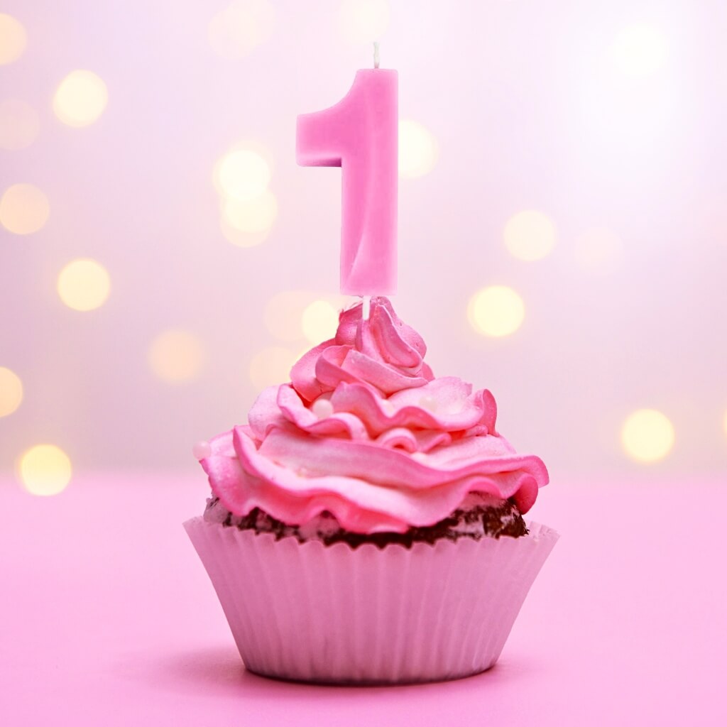 Single pink number 1 candle for milestone birthday cake