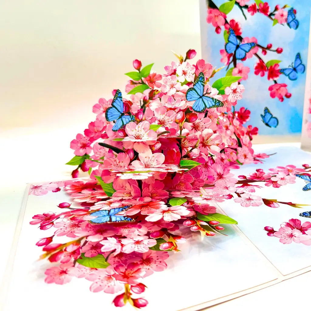 Pink cherry blossom garden with blue butterflies 3D pop-up greeting card