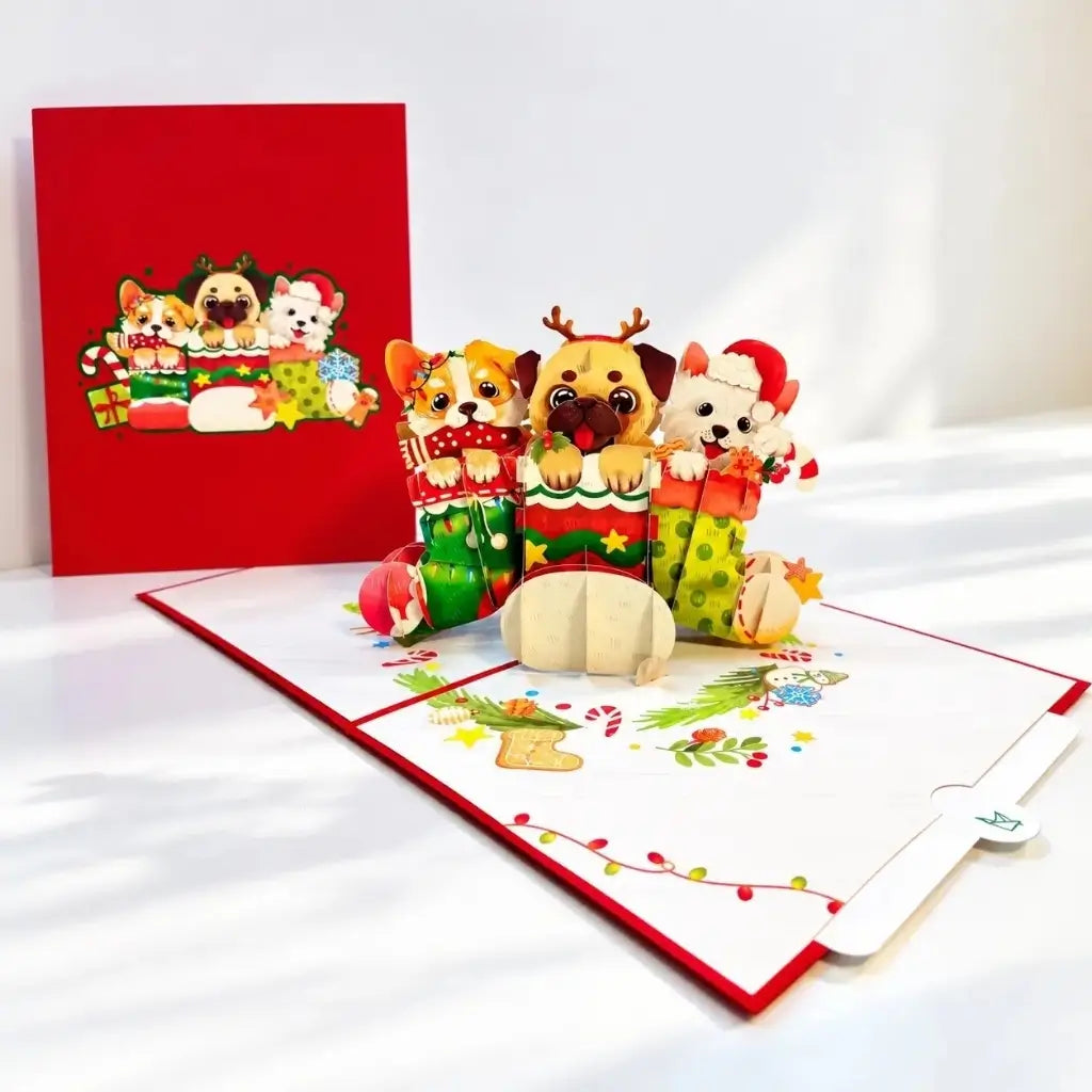 Three Christmas puppies in stockings 3D pop-up greeting card