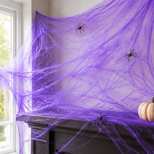Purple stretch spiderweb Halloween decoration with two black spiders