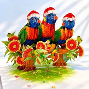 Rainbow lorikeet 3D Christmas card displayed with festive decorations
