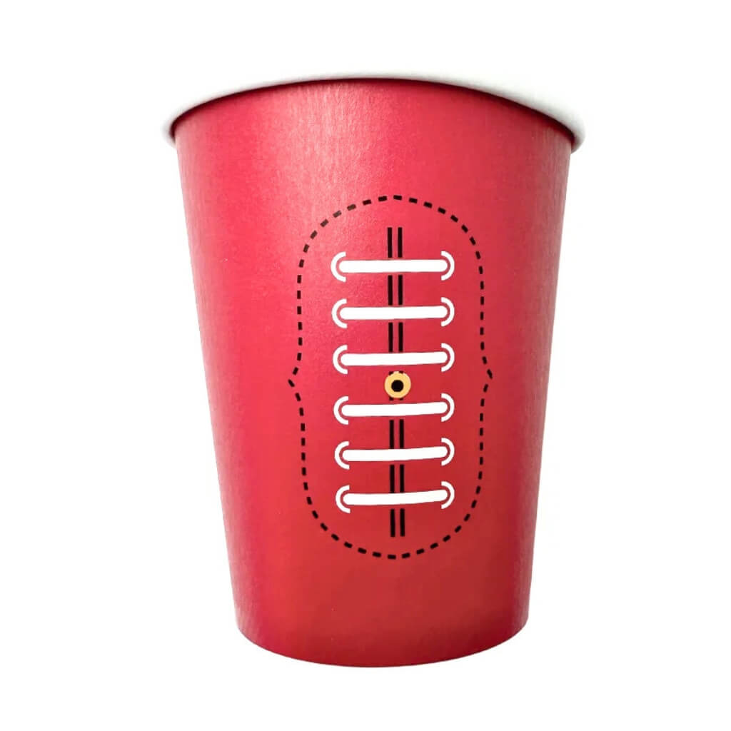 Red paper cup with football design on a white background