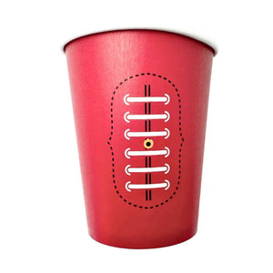 Red paper cup with football design on a white background