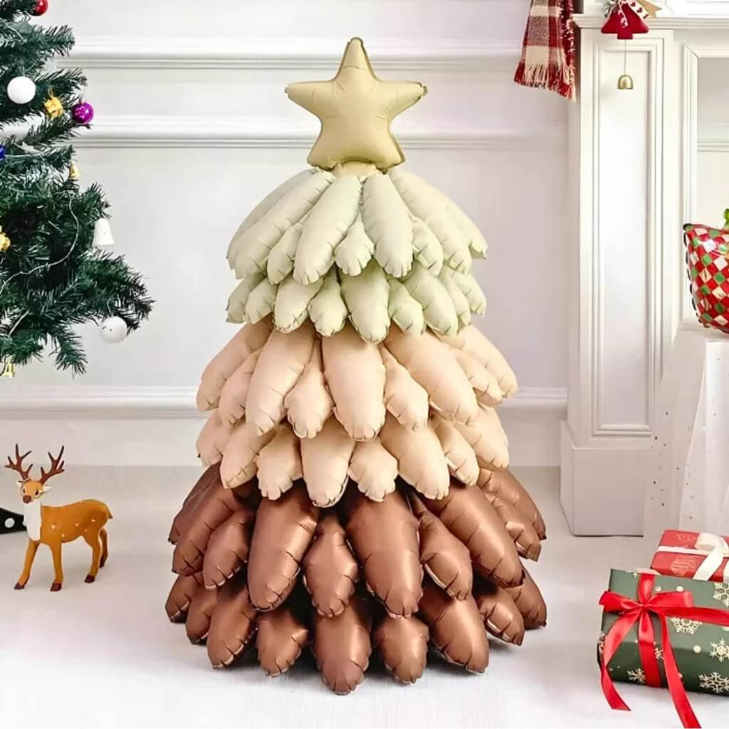 Retro-style Christmas tree foil balloon with warm tones and golden bell topper
