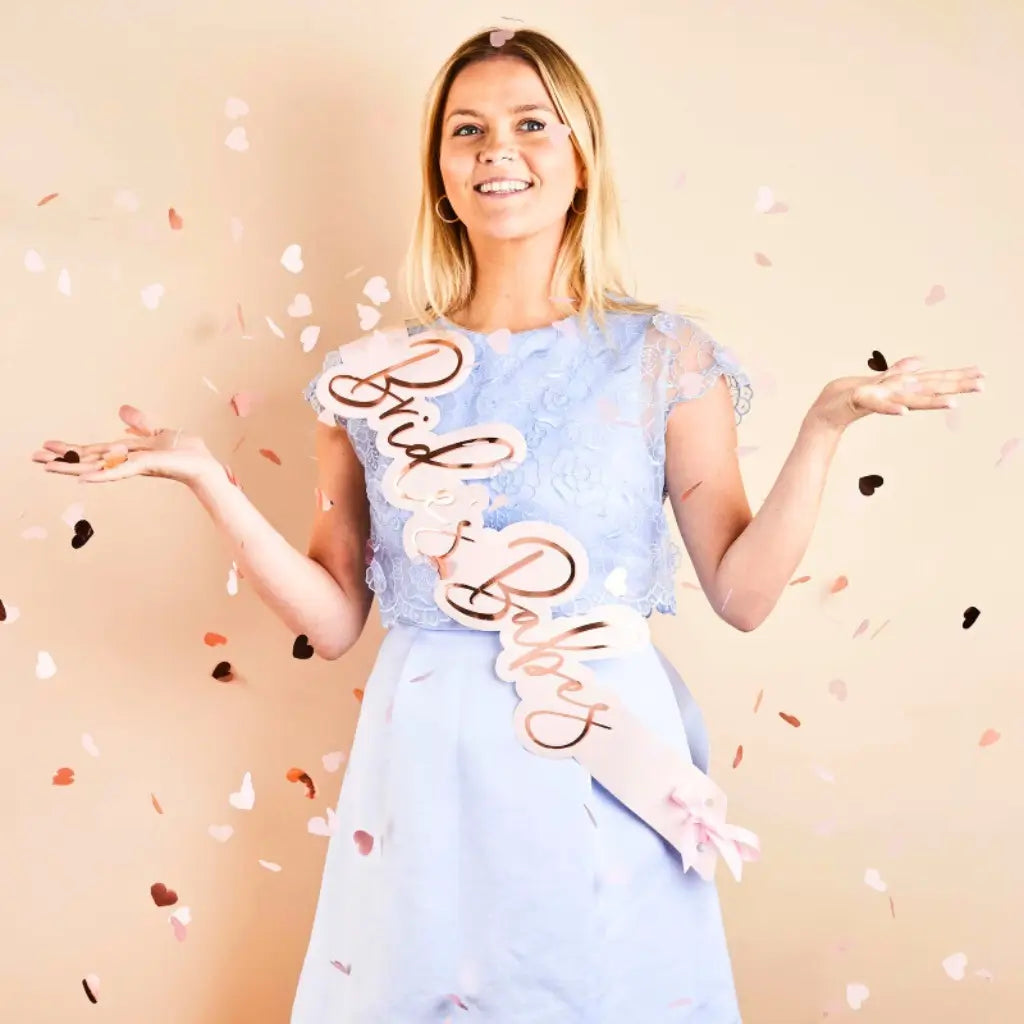 She Said Yaaas Brides Babes blush pink paper sashes with rose-gold foil text