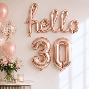 Air-filled Rose Gold 'hello 30' Script Birthday Foil Balloon Banner Bunting.
