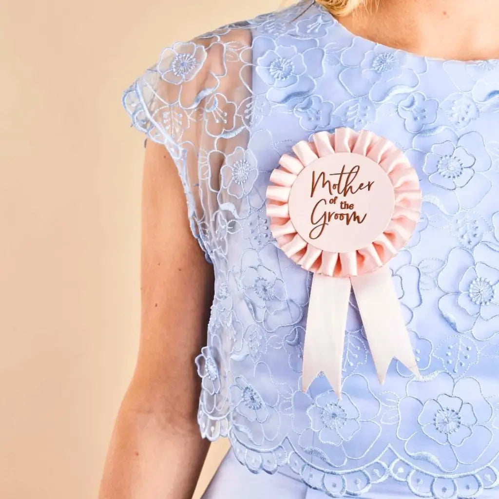 She Said Yaaas Mother of the Groom Badge in blush pink satin with rose-gold foil ribbons