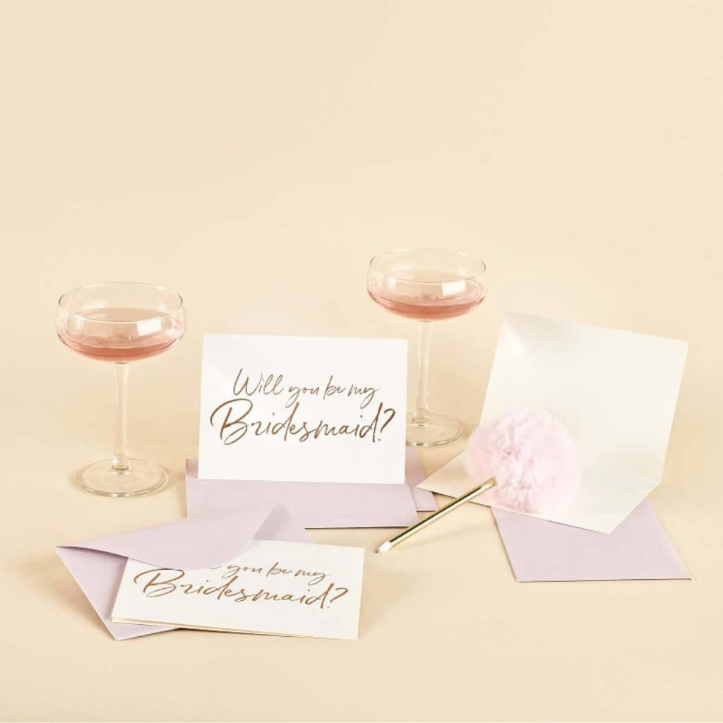 Will You Be My Bridesmaid cards with rose gold foil and blush envelopes